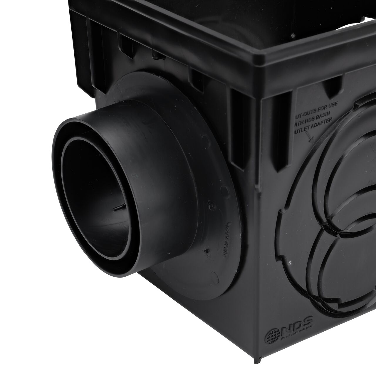 The NDS Offset Outlet Adapter (NDS 1245) installed on an NDS 9 in. Catch Basin Drain (NDS 900) with the offset/outlet in one side position