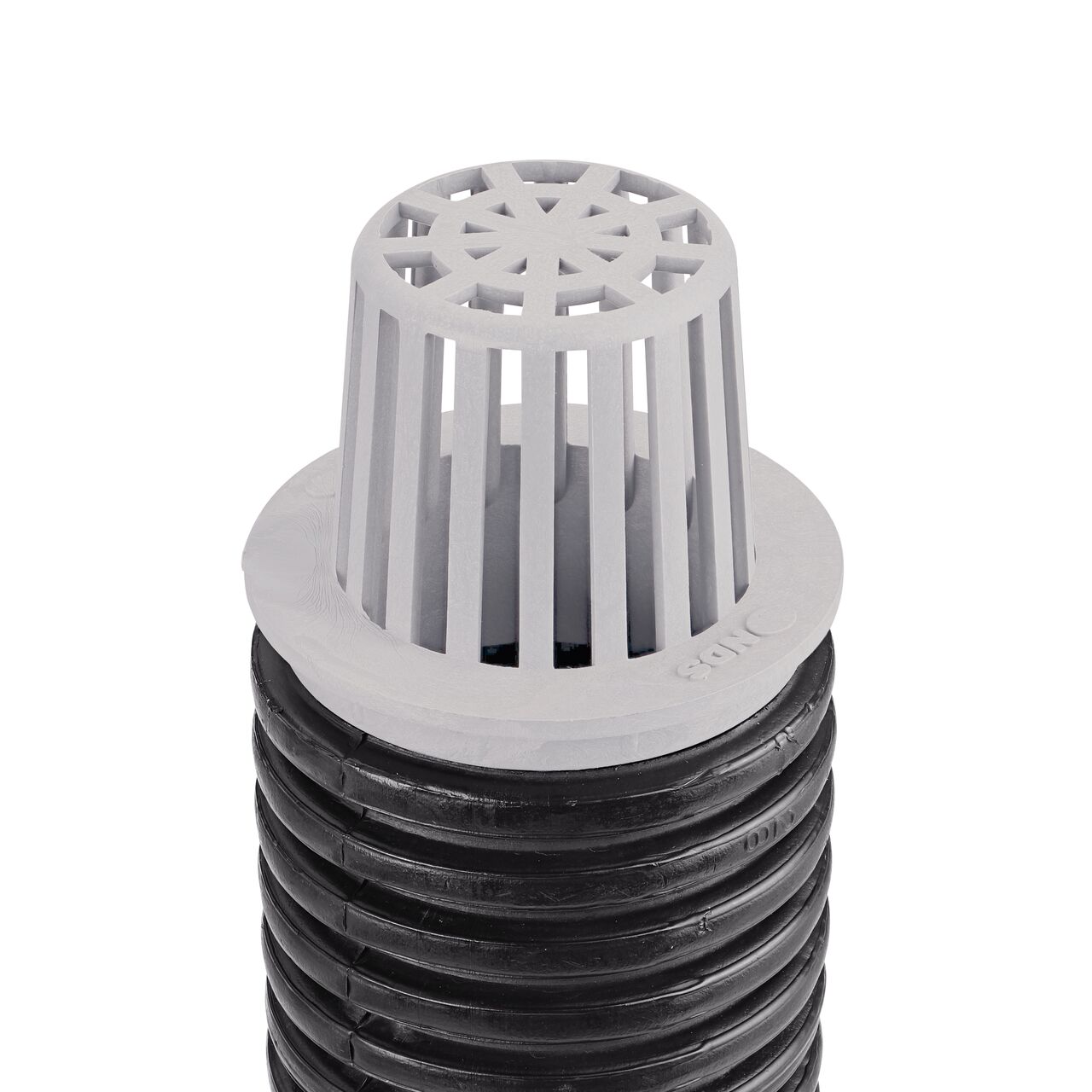 NDS Gray Plastic 3 in. Atrum Grate (NDS 72) installed on 3 in. Single-Wall Corugated Pipe