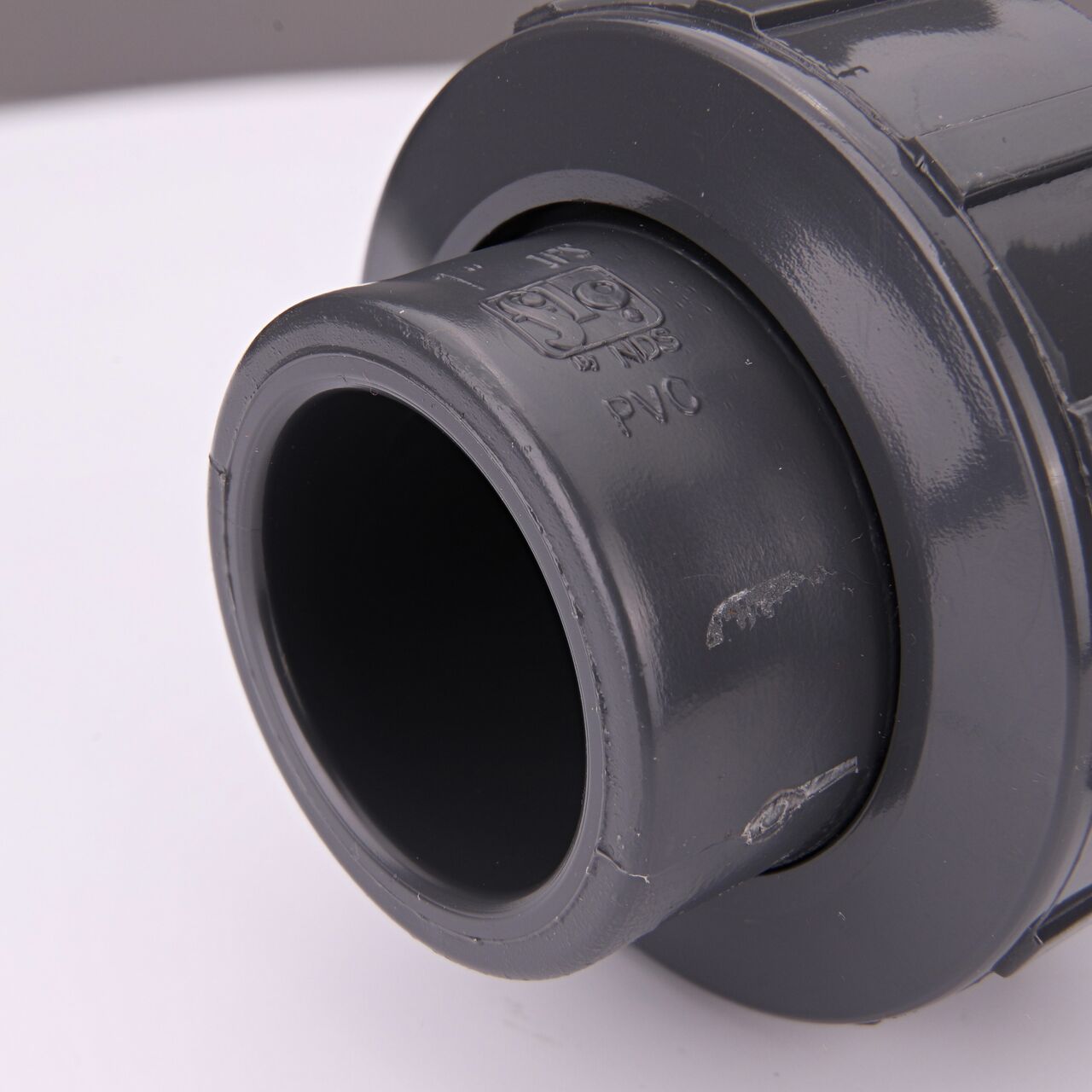 Closeup view of the other slip end on the NDS 1 in. PVC Union (NDS U2-1000-S) used to connect pipes and provide a quick way to separate pipes when needed