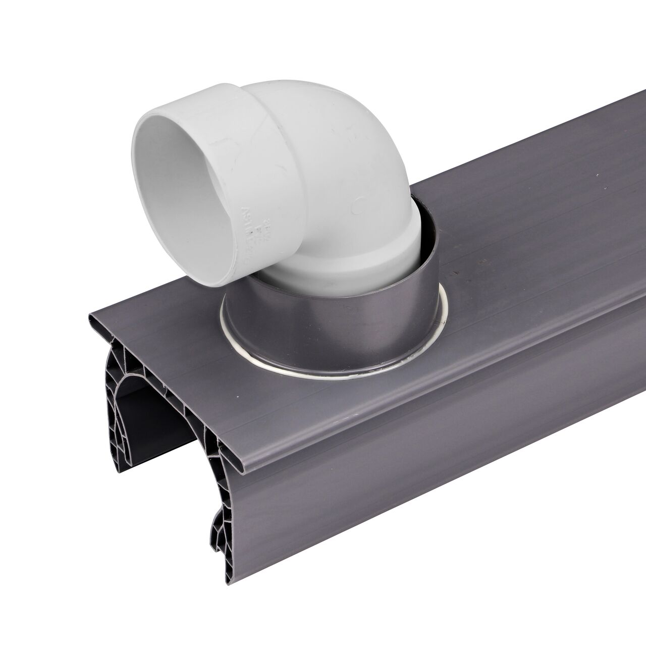 Connect 3 inch or 4 inch sewer and drain fittings to the NDS Spee-D® Channel Drain with Bottom Outlet (NDS 234) shown here with a NDS 3 inch PVC S&D 90° Elbow (NDS 3P02)