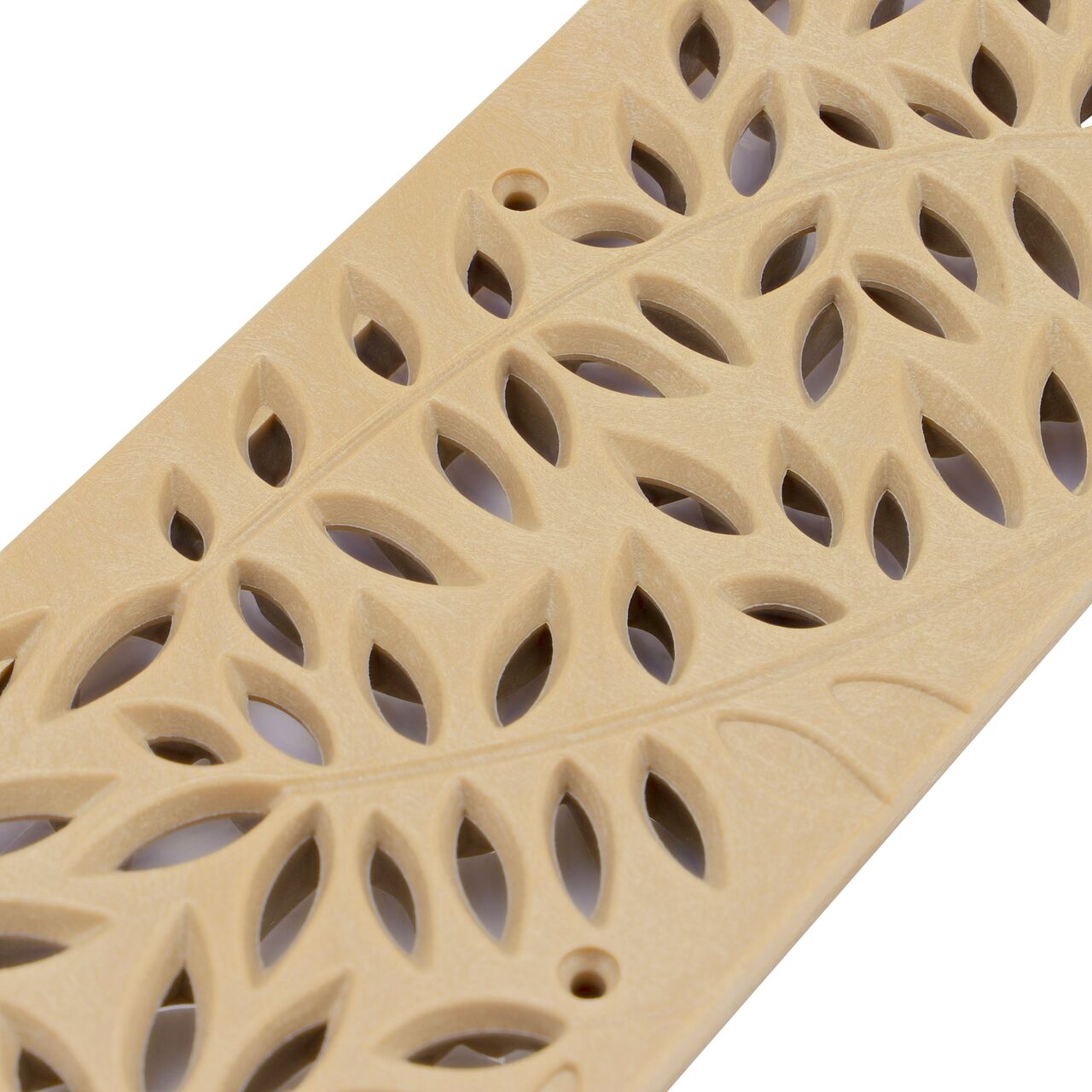 Angled view of the NDS Spee-D® Channel Drain Grate, Decorative Botanical Design in Sand Plastic (NDS 252S)