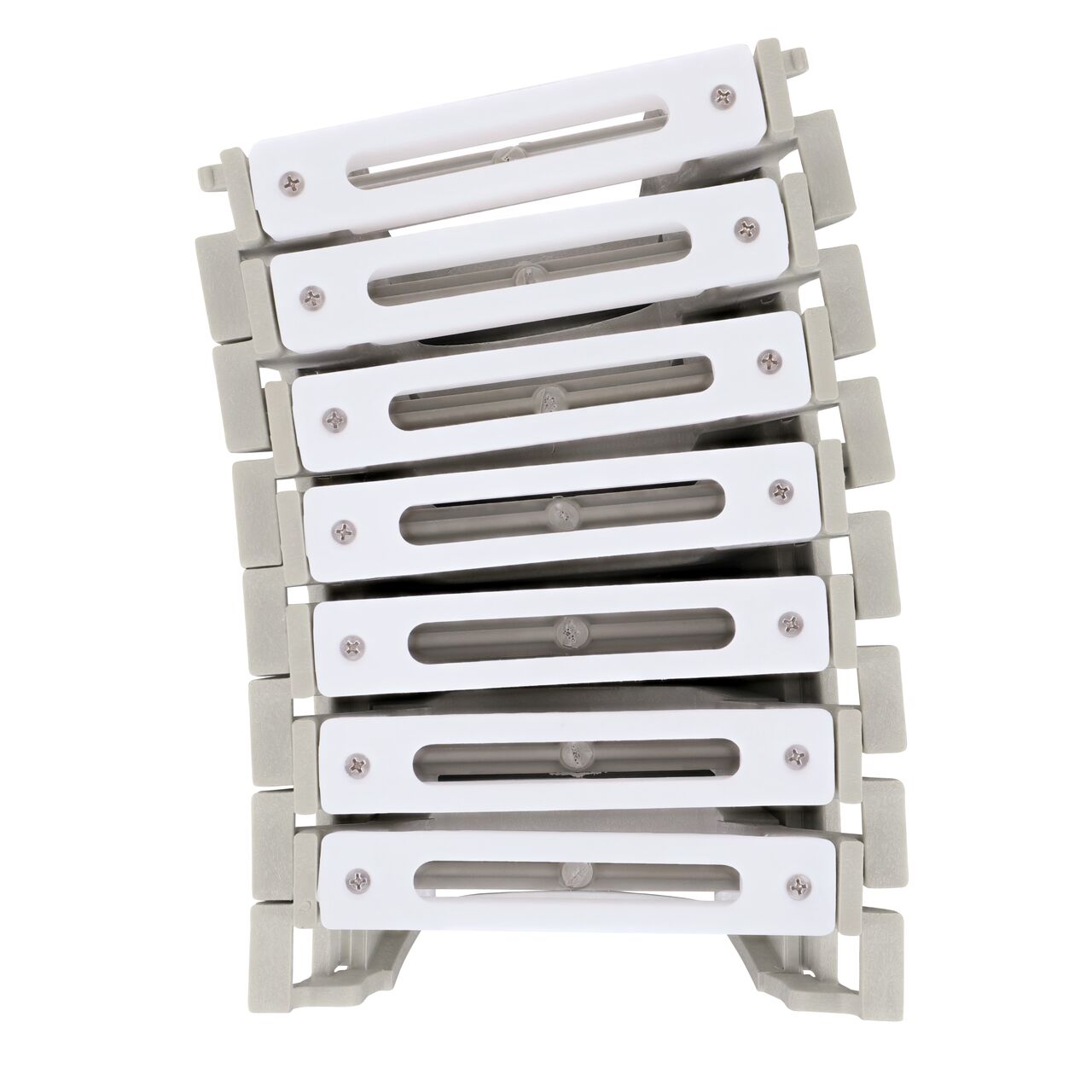 Top down view of 3 degree bend in Seven White Slotted Plastic Dura Slope™ Channel Drain EZ-Track™ Radius Coupling Grates (NDS DS-660MG) installed on seven Dura Slope EZ-Track Radius Couplings (NDS DSRC)
