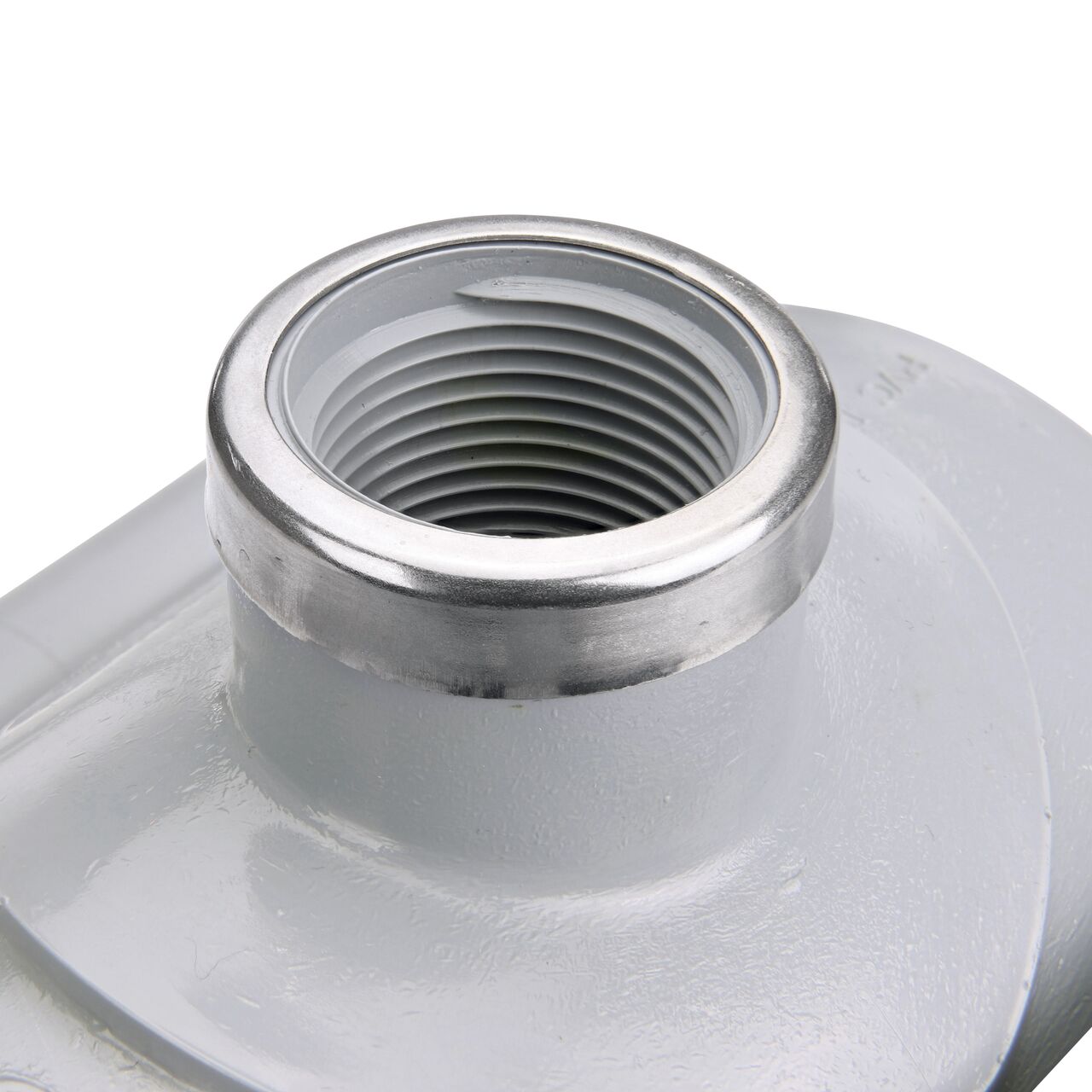 Closeup of the 1 in. FPT connection on the NDS Clamp-It™ Rigid PVC Saddle (NDS 443010) for 3 in. PVC pipe