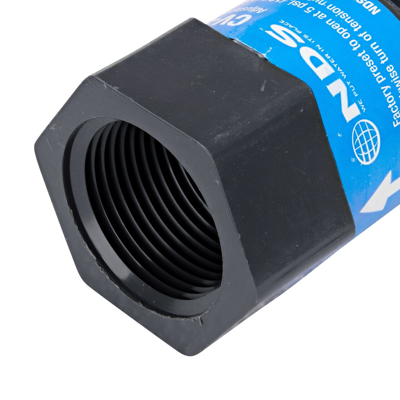 Closeup of the FPT end of the NDS Gray 1 in. IPS MPT X FPT PVC Adjustable Inline Spring Check Valve (NDS CV-1000-MF)