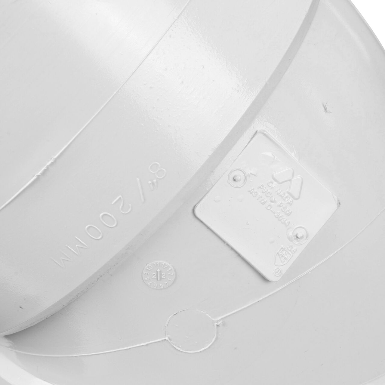 Closeup of any wording on the PVC 45° elbow, which connects 8 in. Sewer and Drain pipes, Hub X Hub connection (NDS 8P03)