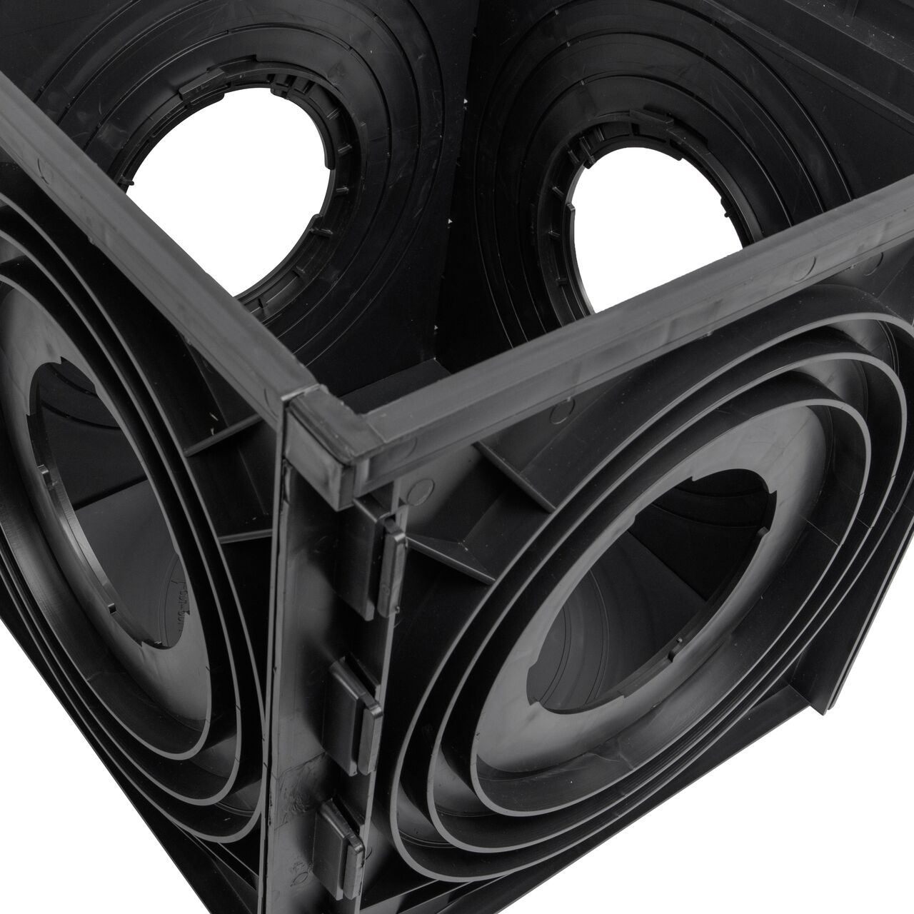 Top down closeup view of the inside of the NDS 18 in. Expandable Catch Basin Drain with 4 Openings (NDS 1804)