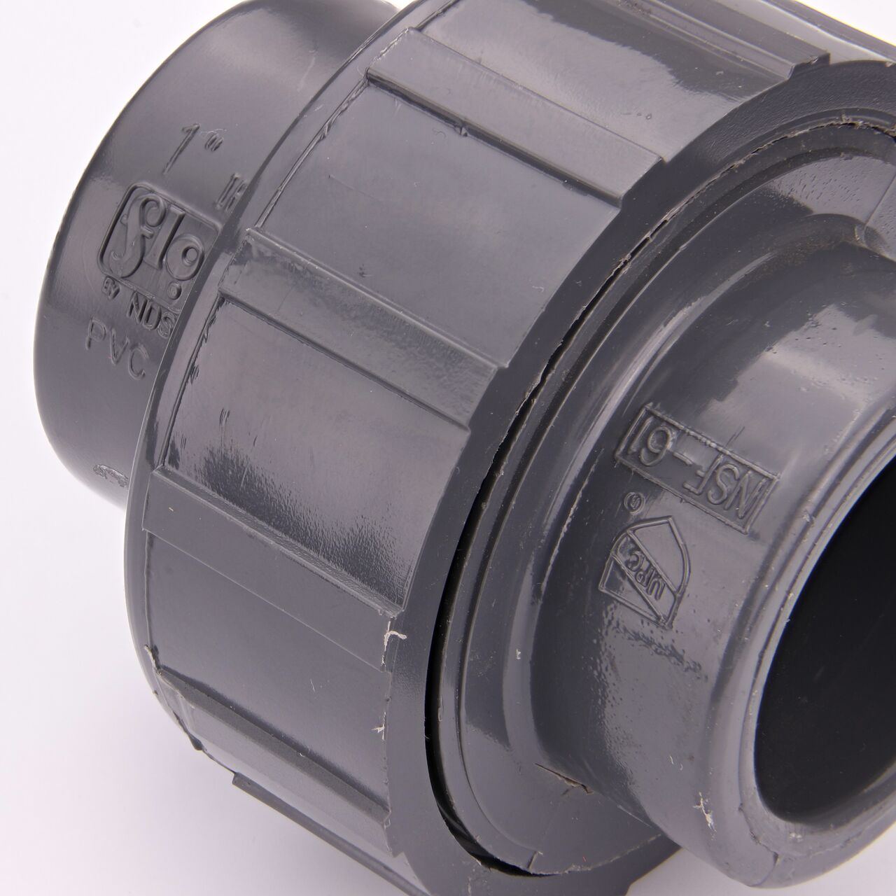 Close up view of the NDS 1 in. PVC Union showing NDS brand a leader in flow management solutions and the preferred choice of professionals since 1972 mark (NDS U2-1000-S)