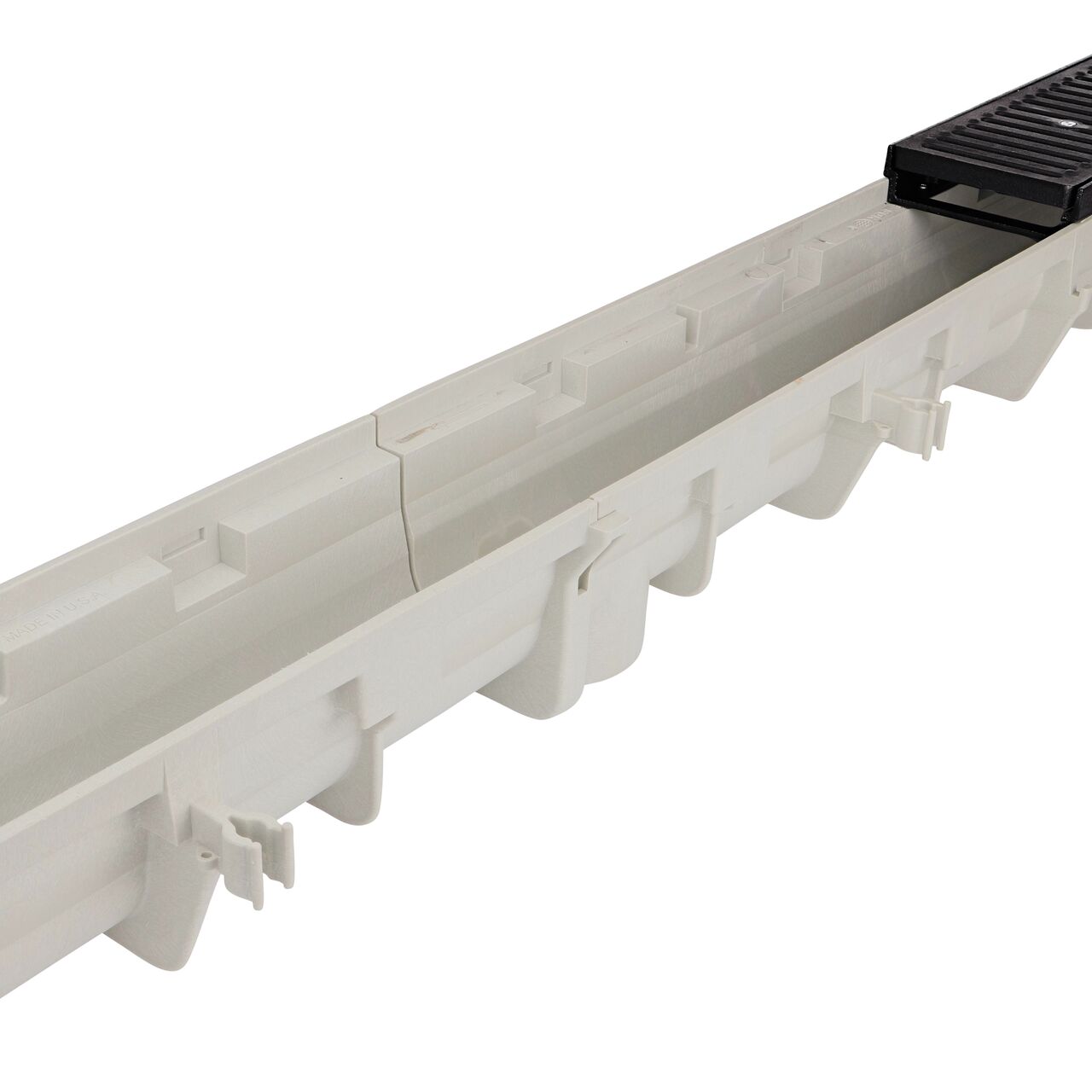 Closeup of how the Dura Slope™ Channel Drain Frame (NDS DS-200H) with Cast Iron Dura Slope™ Channel Drain Grate (NDS DS-231) installs on mulitiple NDS Dura Slope Channel Drains (NDS DS-091)