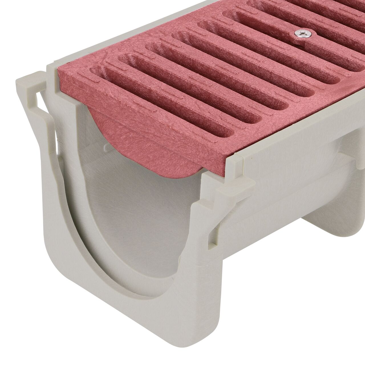 Closeup View of the brick red plastic Dura Slope™ Channel Drain Grate (NDS 665) installed on the Dura Slope Channel Drain (NDS DS-091)