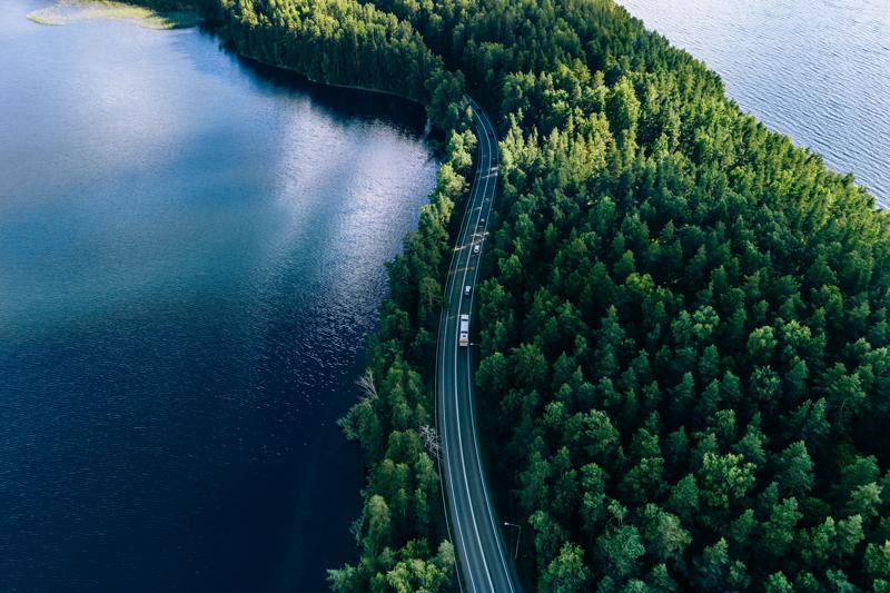 road curving along water