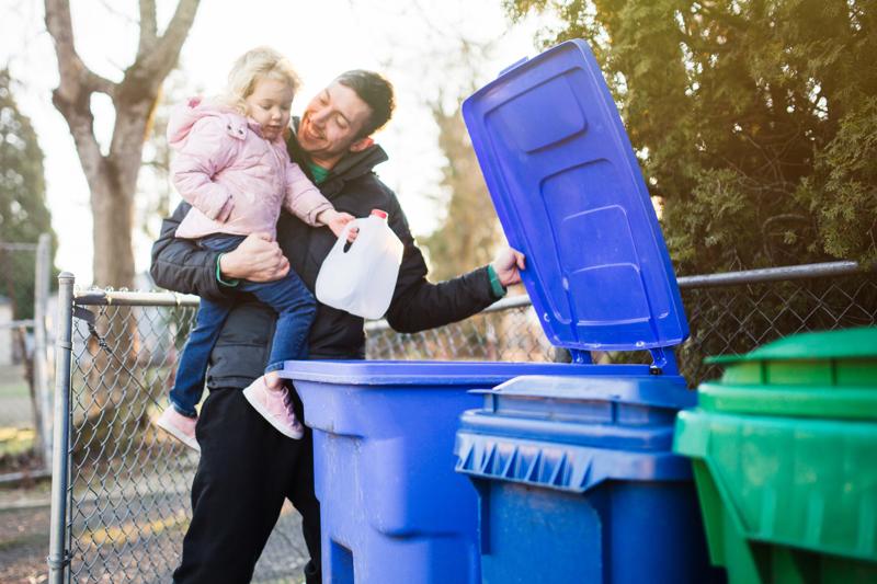 Dad and Kid Recycling