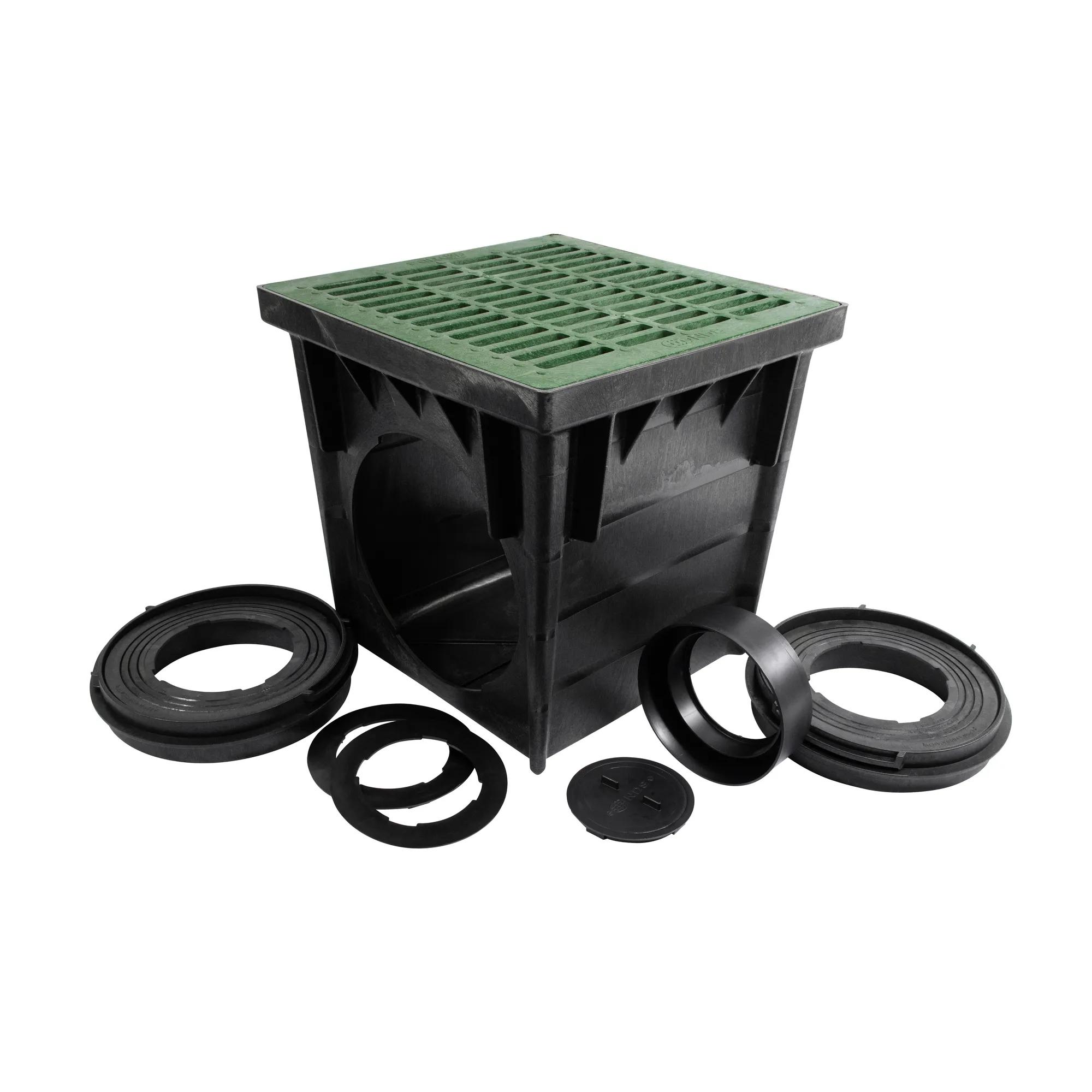 Unassembled Black plastic 24 in. Catch Basin Drain Kit (NDS 2400GRKIT) with a green grate (NDS 2412), adapters (NDS 2410, NDS 1888, NDS 1890) that connects to 8 in. and 10 and 12 in. drainage pipes, and plug (NDS 1206)